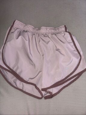 Nike Women's Light Pink Athletic Shorts with Mauve Trim